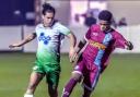 Kazim Waite-Jackson, right, shields the ball from an opponent during 1874 Northwich's meeting with Charnock Richard on Thursday. Picture: Ian Dutton