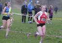 Katie Lowery just ahead of her sister Emily in the Cheshire Cross Country Championships women's under 20s race. Picture Mike Boden