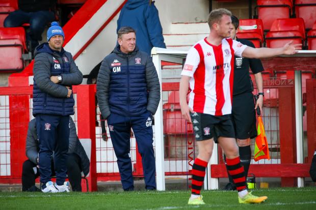 Witton Albion manager Carl Macauley, left, keeping a close eye on affairs during the 2-1 home loss to Lancaster City. Picture: Karl Brooks Photography