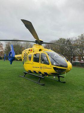 An air ambulance landed on Bakehouse field in Weaverham after a crash between a blue Honda and a grey Toyota Aygo