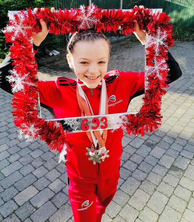 Northwich Guardian: Caitlin Price getting very festive with her decorated competition number