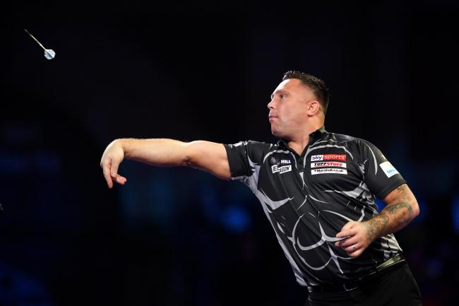 He won the PDC World Darts Championship at the Alexandra Palace in January 2021 but who is he? See question 14. Picture: PA