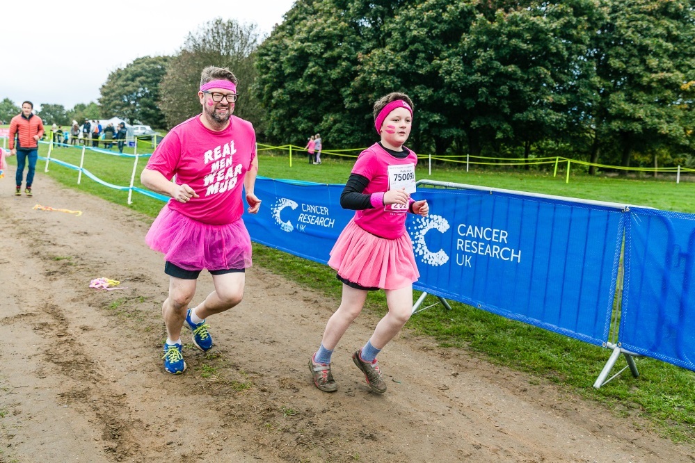 Race For Life runners taking part in a 2021 event