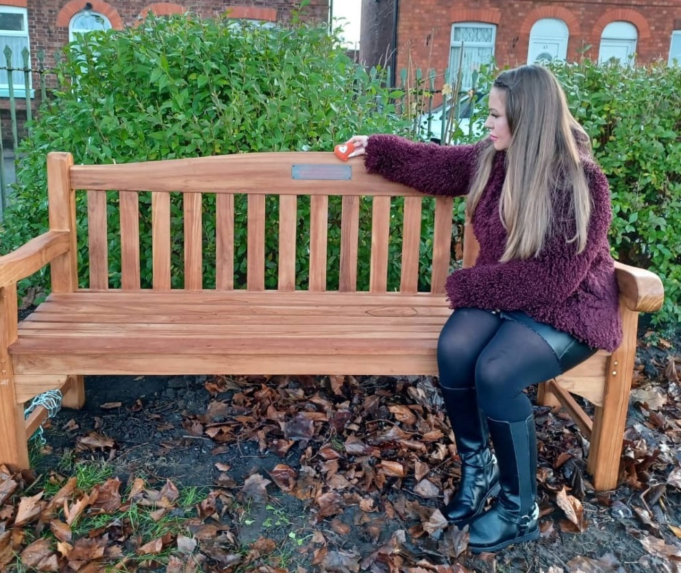 Louise on Casons memorial bench