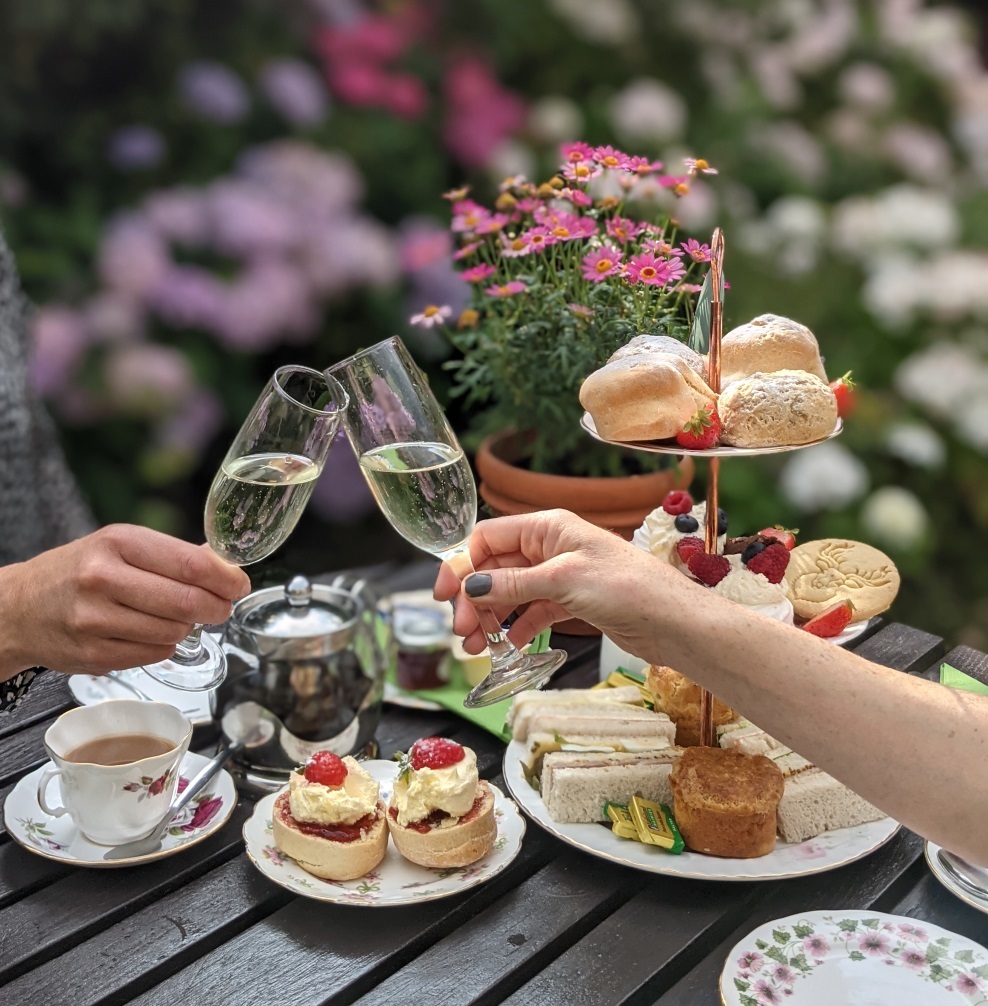 Enjoy a glass of wine with afternoon tea