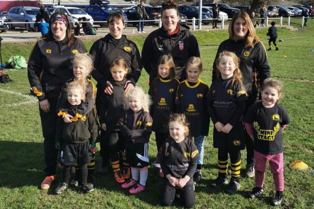 Northwich RUFC coaches Kerry Stead, Emily Underhill and Karen Simpson with England rugby league international Amy Johnson and the girls from pre-school to under 8s