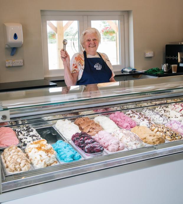 Northwich Guardian: Adam's nan Betty Hague with some of the 24 varieties of ice cream on sale in the farm shop