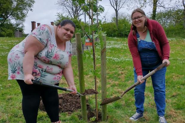 Ruth Sutcliffe and Charlotte Poole, president of Winsford Salt Sisters WI, with the newly-planted Mountain Ash.