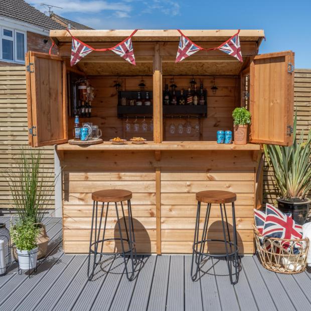 Northwich Guardian: Wooden Shiplap Garden Bar. Credit: The Range