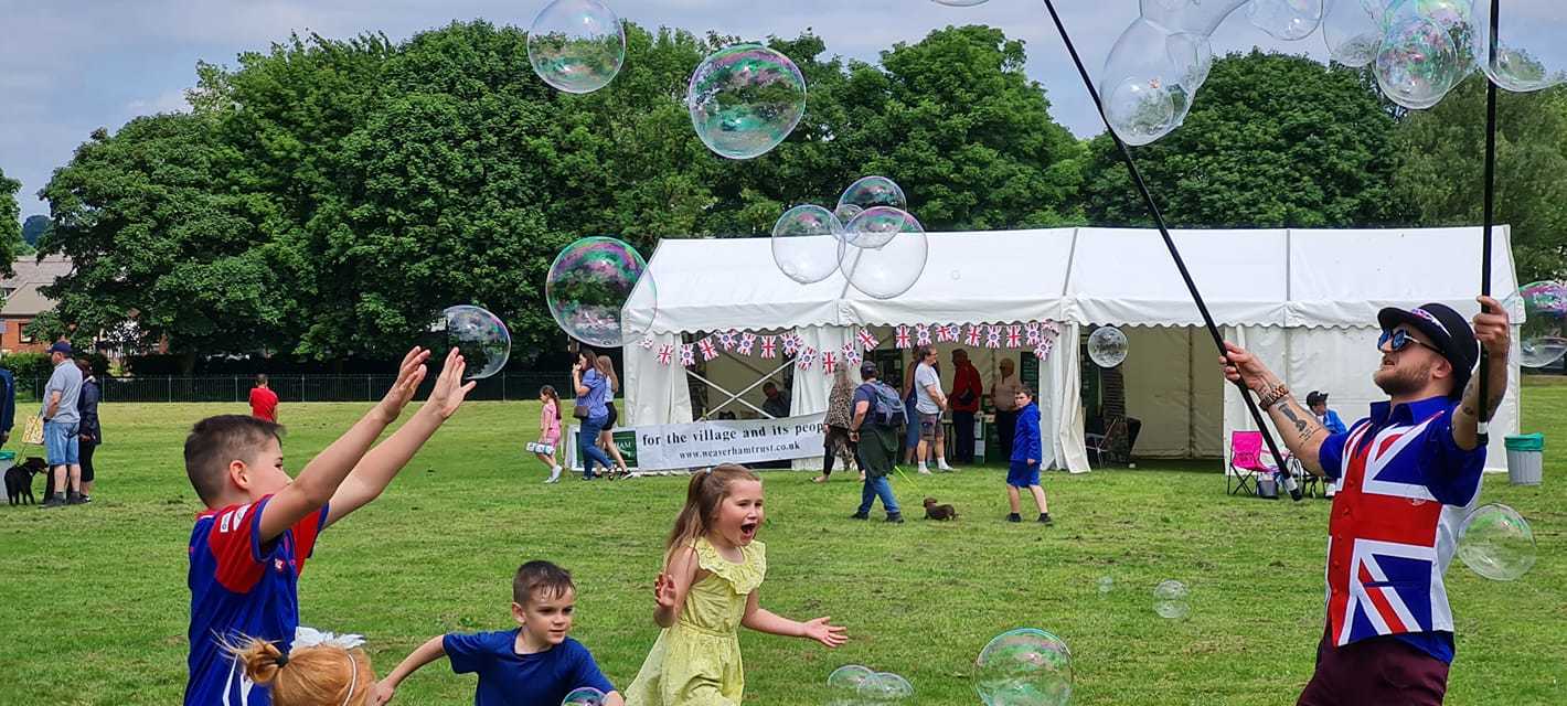 Cathie Leathers bubble magic at Lakehouse Field