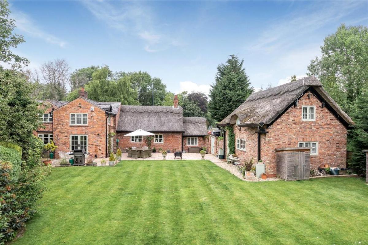 This Grade II listed cottage is located in the countryside outside Wilmslow - Photo: Right Move/Jackson-Stops, Alderley Edge
