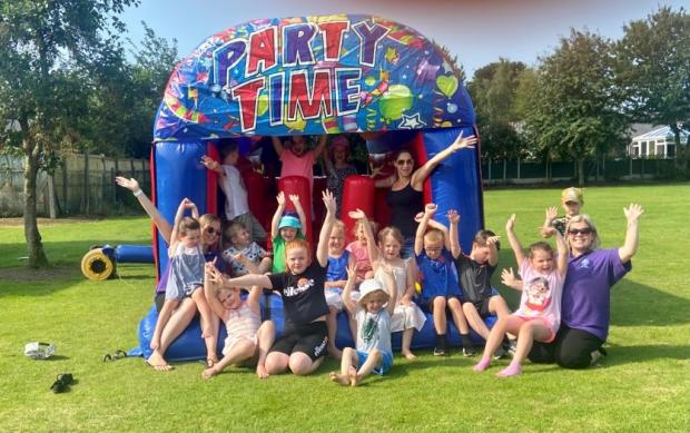 Northwich Guardian: Children enjoying a bouncy castle as part of the Holiday Activity Fund