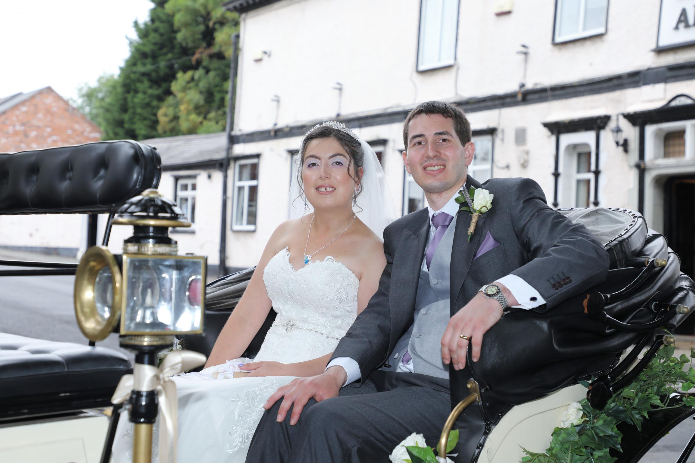 Emma and Charles enjoyed a horse drawn carriage ride on their wedding day