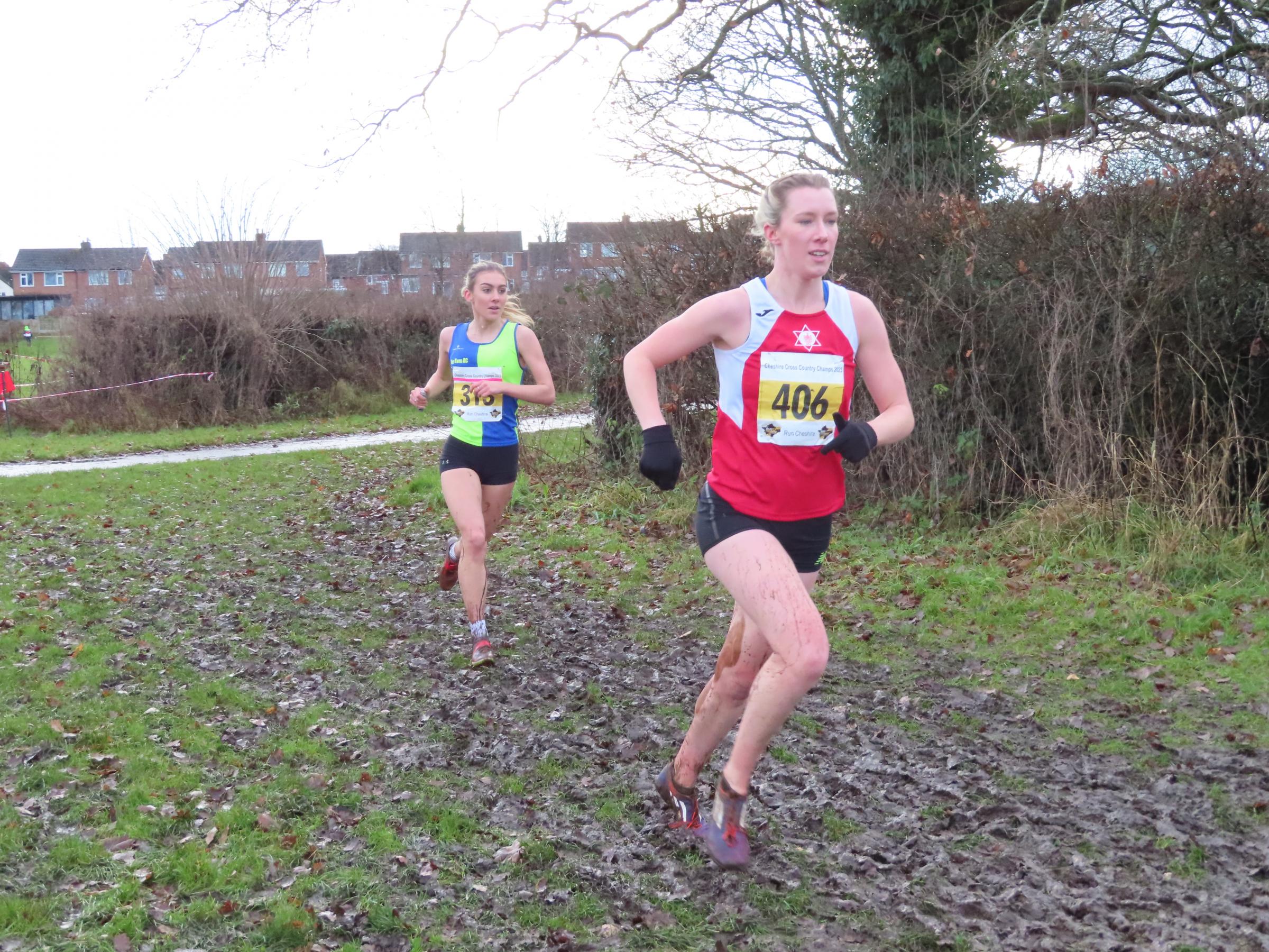 Vale Royals Holly Weedall chasing senior womens race winner Harriet Knowles Jones. Picture: Rob Brown
