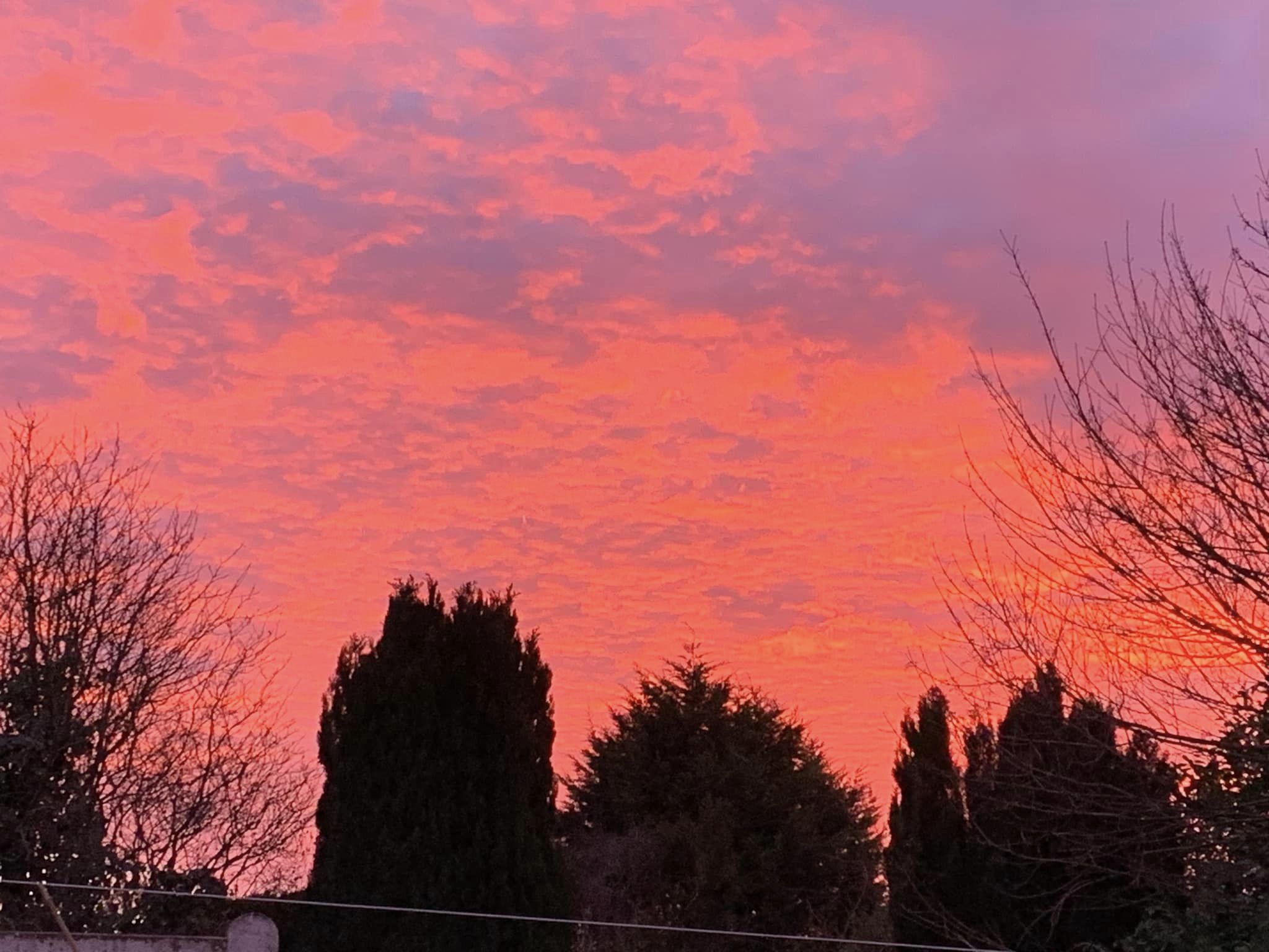 Orange clouds in Weaverham by Alma Stelfox