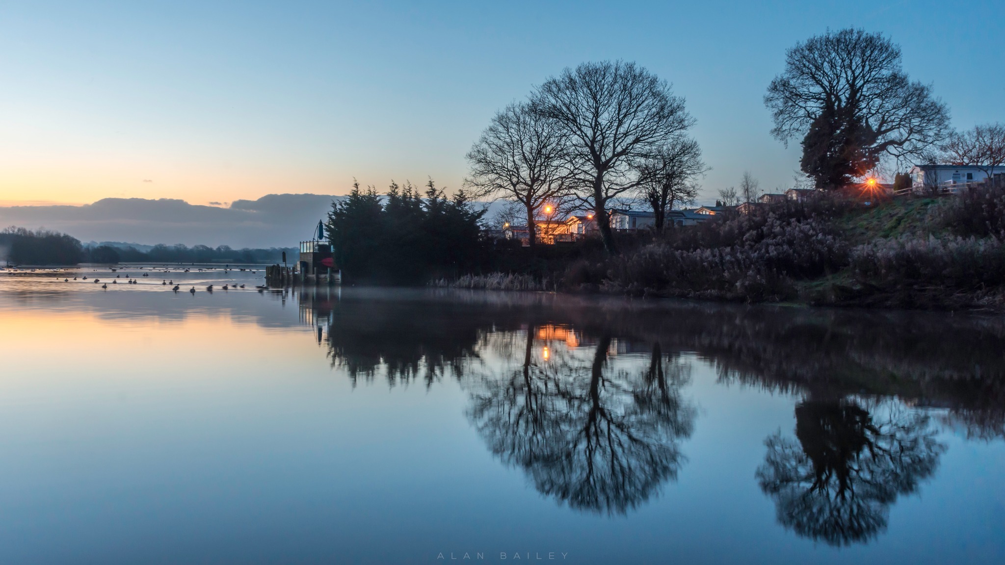 Just before sunrise in the blue hour at Winsford Flash by Alan Bailey