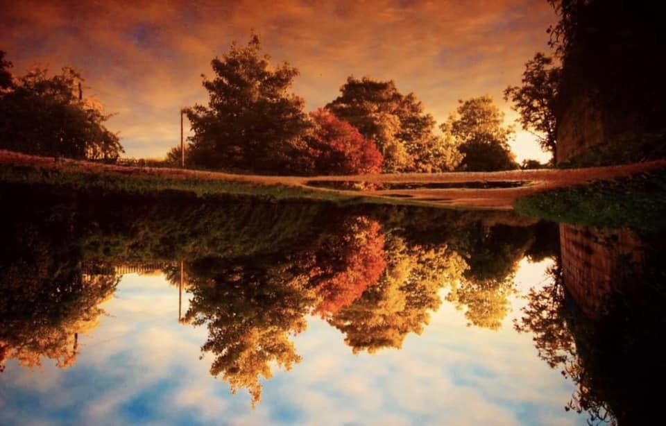 Autumn puddle reflection in Middlewich by Ryan Mottram