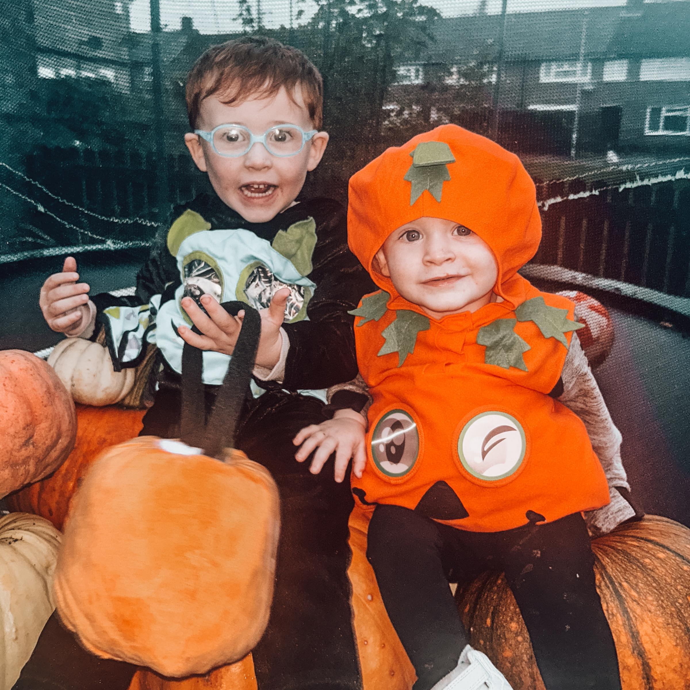 Lucas and Jaxon Healey-McDaid dressed as a bat and a pumpkin from Knutsford