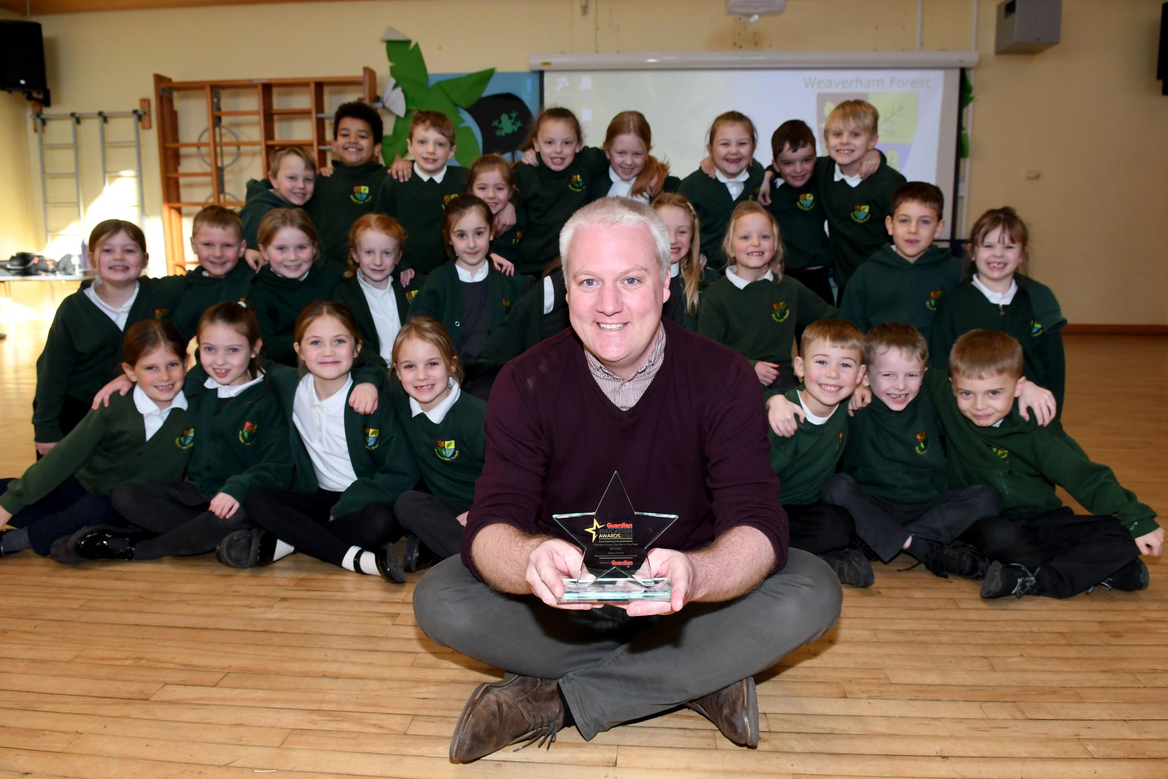 Primary School Teacher of the Year celebrates with his year two class1