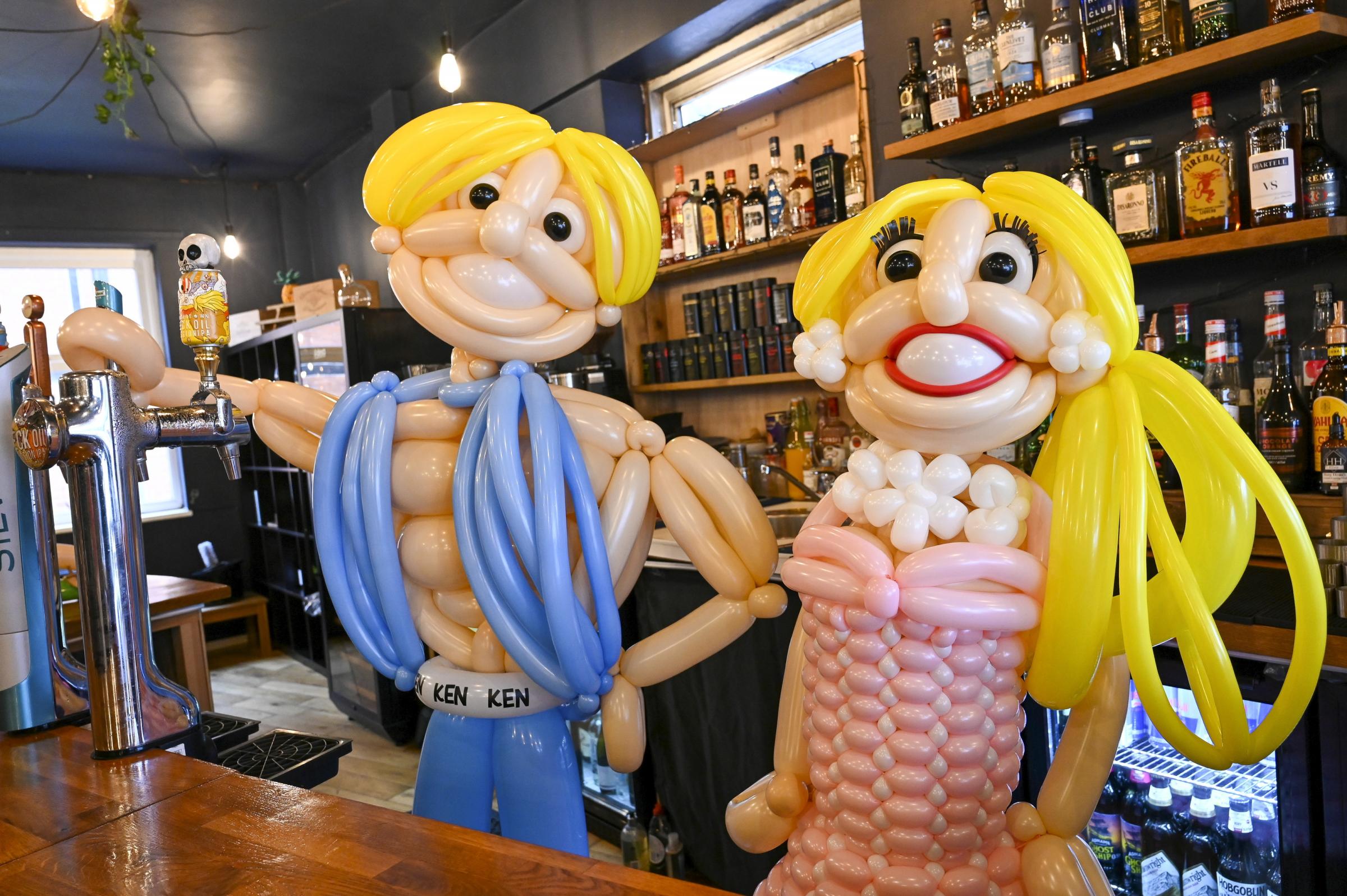 Barbie and Ken pull pints at the Grape and Bean bar in Northwich. Picture: SWNS