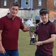 Tom Vickers receiving the Cowley Cup from Dave Buckley of the competition sponsors Rudheath Sports & Social Club