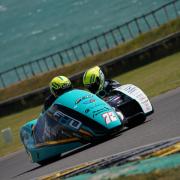 Pete Founds and Jevan Walmsley on their way to British Sidecar Championship success at Anglesey. Picture: Ste McNorton