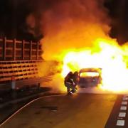 Photos show scale of fire which destroyed car and closed M6