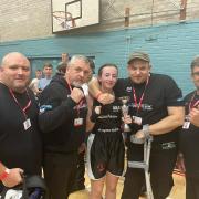 Isabella Dempsey with the Superbox coaching team