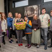 Motherwell Cheshire founder Kate Blackmore and Edna Fletcher (centre left and right) with supporters of the community laundrette project