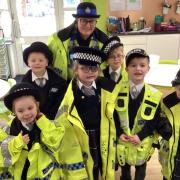 PCSO Michelle Gillet with pupils on a visit to Weaverham Primary Academy