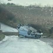 A car was flipped onto its roof during a crash near Great Budworth