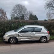 A car was abandoned on the roadside following a crash