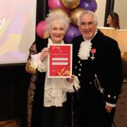 High Sheriff of Cheshire Dennis Dunn presents Kim Smith with the Hoppy Award for Outstanding Service to the Community