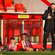 Witton Albion manager Jon Macken, working the dug-out during Saturday's semi-final success against Winsford United
