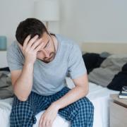 A man tired after waking up (stock image)