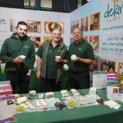 (L to R): Delamere's Dairy's Dan Yates, Clare Boothman, and John Ord exhibiting at the Cheshire Show