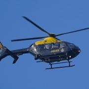 The police helicopter was spotted patrolling the tracks between Cuddington and Greenbank stations