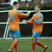 Jordan Cobley, left, and Leon Wright celebrate after a Barnton goal during their away victory at Ellesmere Rangers in the North West Counties League's First Division South. Picture: Robert Hardley
