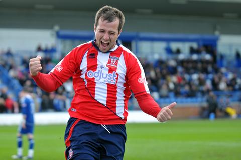 Ashley Stott celebrates scoring the opening goal in April's play-offs final win.