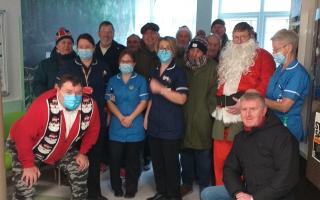 Members of South Cheshire Scooter Alliance and nurses from Leighton Hospital children's ward