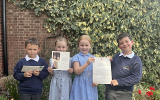 Barnton pupils with their letter and card from the Palace