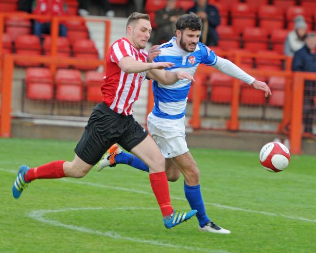Steven Tames, pictured in action against Kettering Town earlier this season, will remain with Witton Albion until the end of the season