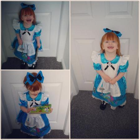 Jessica O'Halloran, two and a half, from Weaverham, is Alice in Wonderland for world book day.