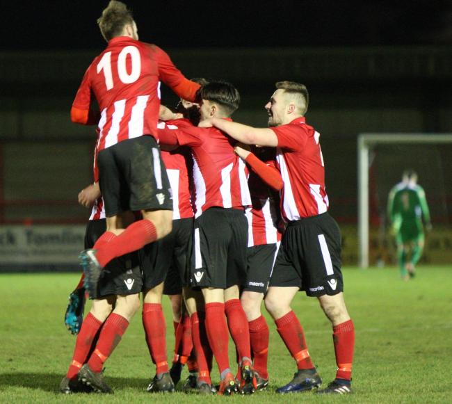 Witton Albion players celebrate after Rob Hopley's goal earns them a share of the spoils against Barwell at Wincham Park on Saturday. Picture: Keith Clayton